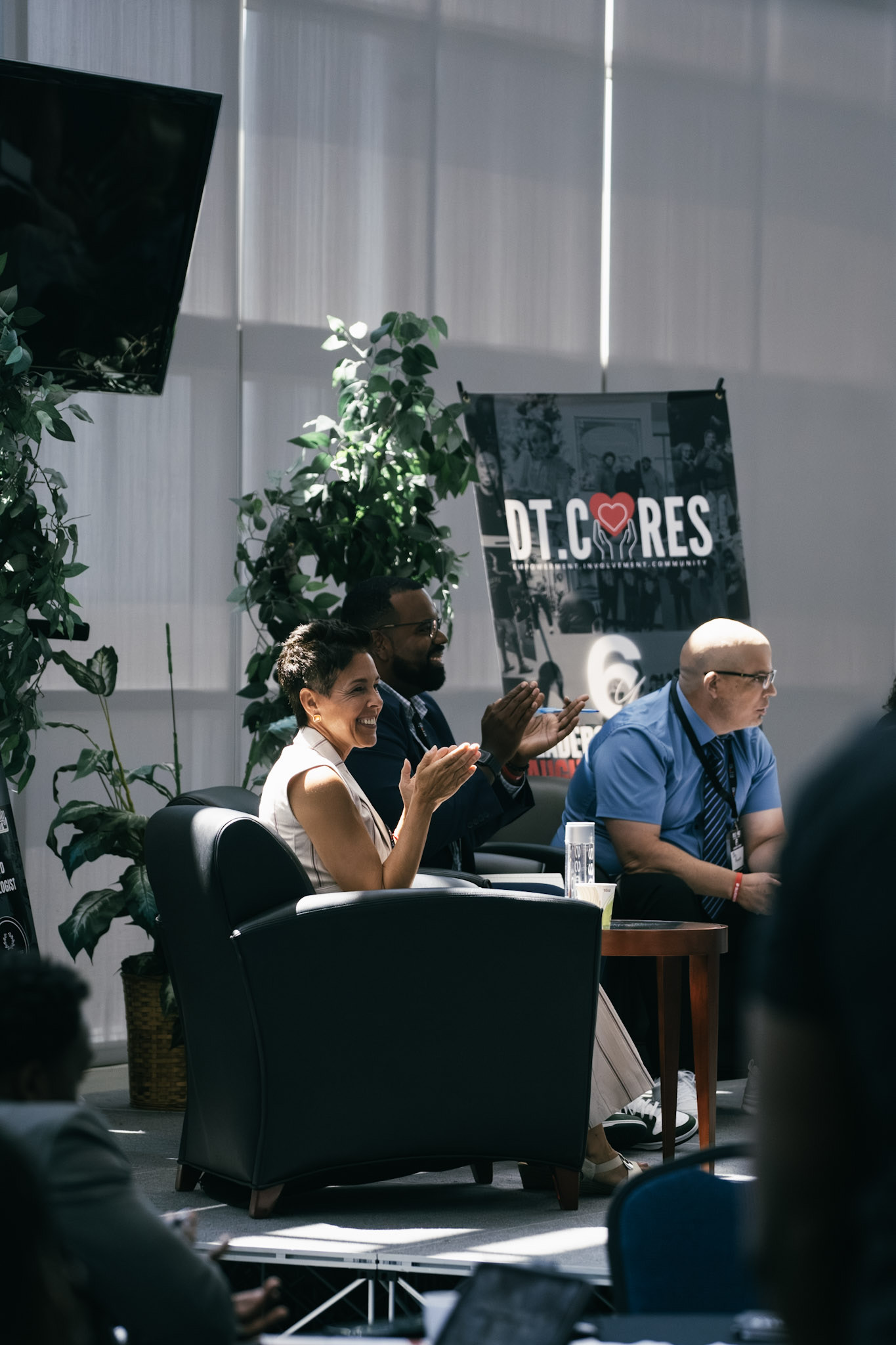 DT Cares panel discussion with community leaders and staff in professional setting