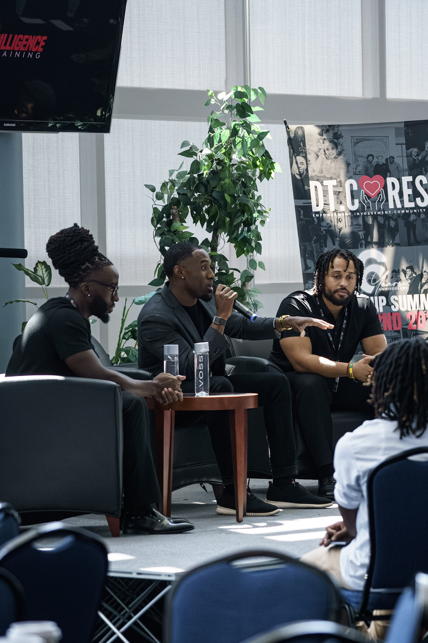 DT Cares leadership panel featuring three speakers discussing youth mentorship