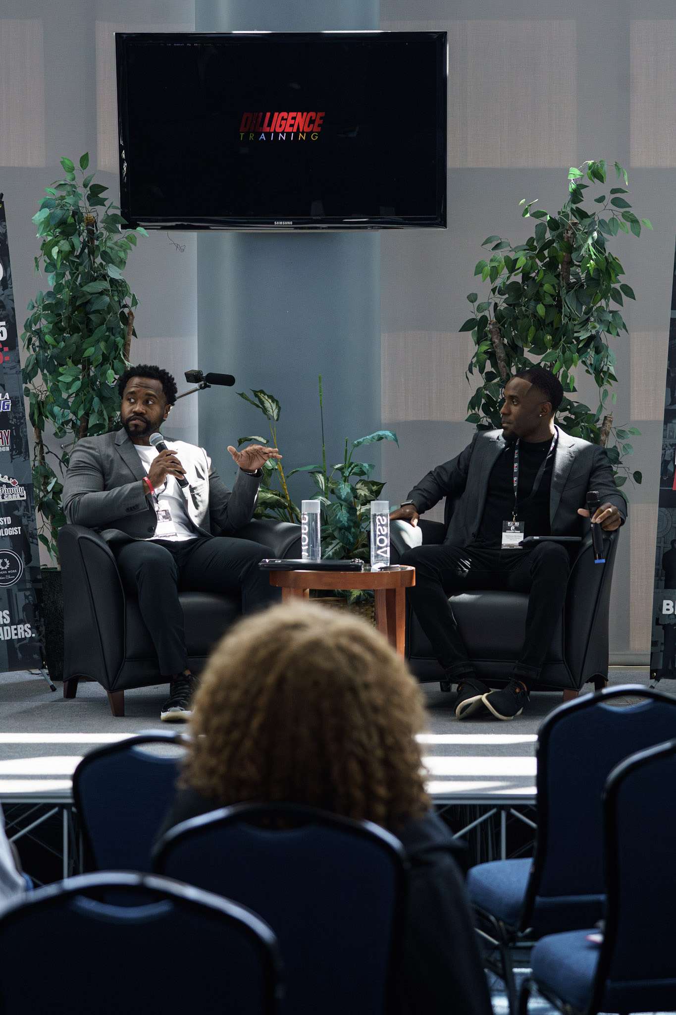 DT Cares intimate discussion between two leaders with audience engagement