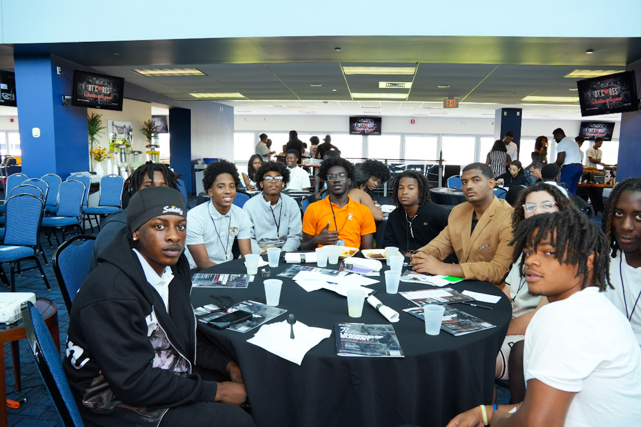Scholar-athletes seated together at the Summit
