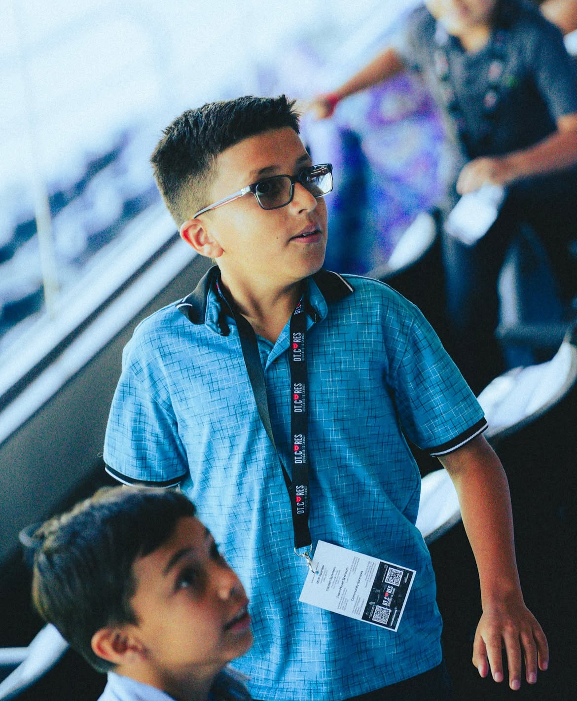 Young attendee with glasses at the summit